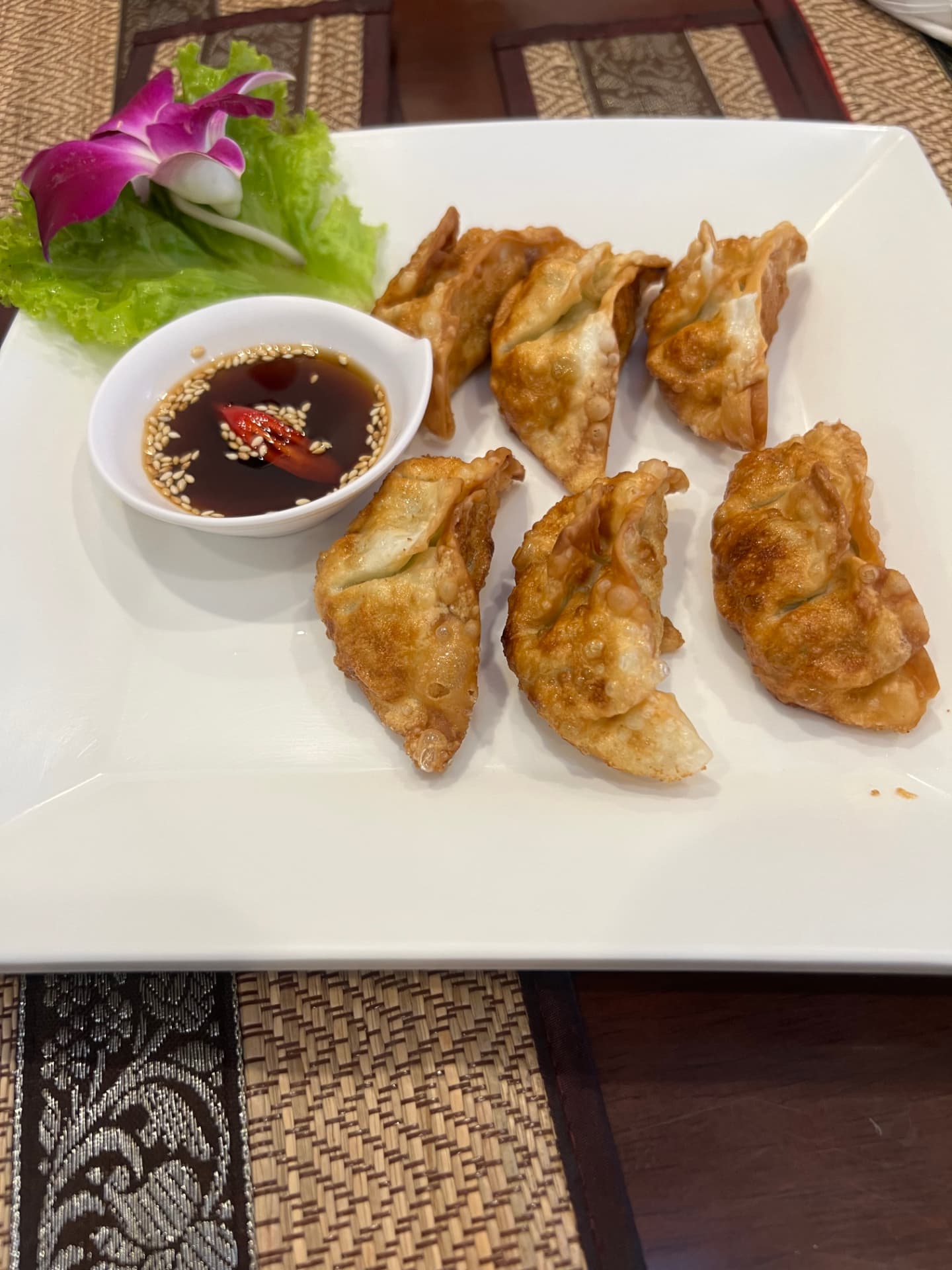 Fried dumplings with soy dipping sauce in Phuket