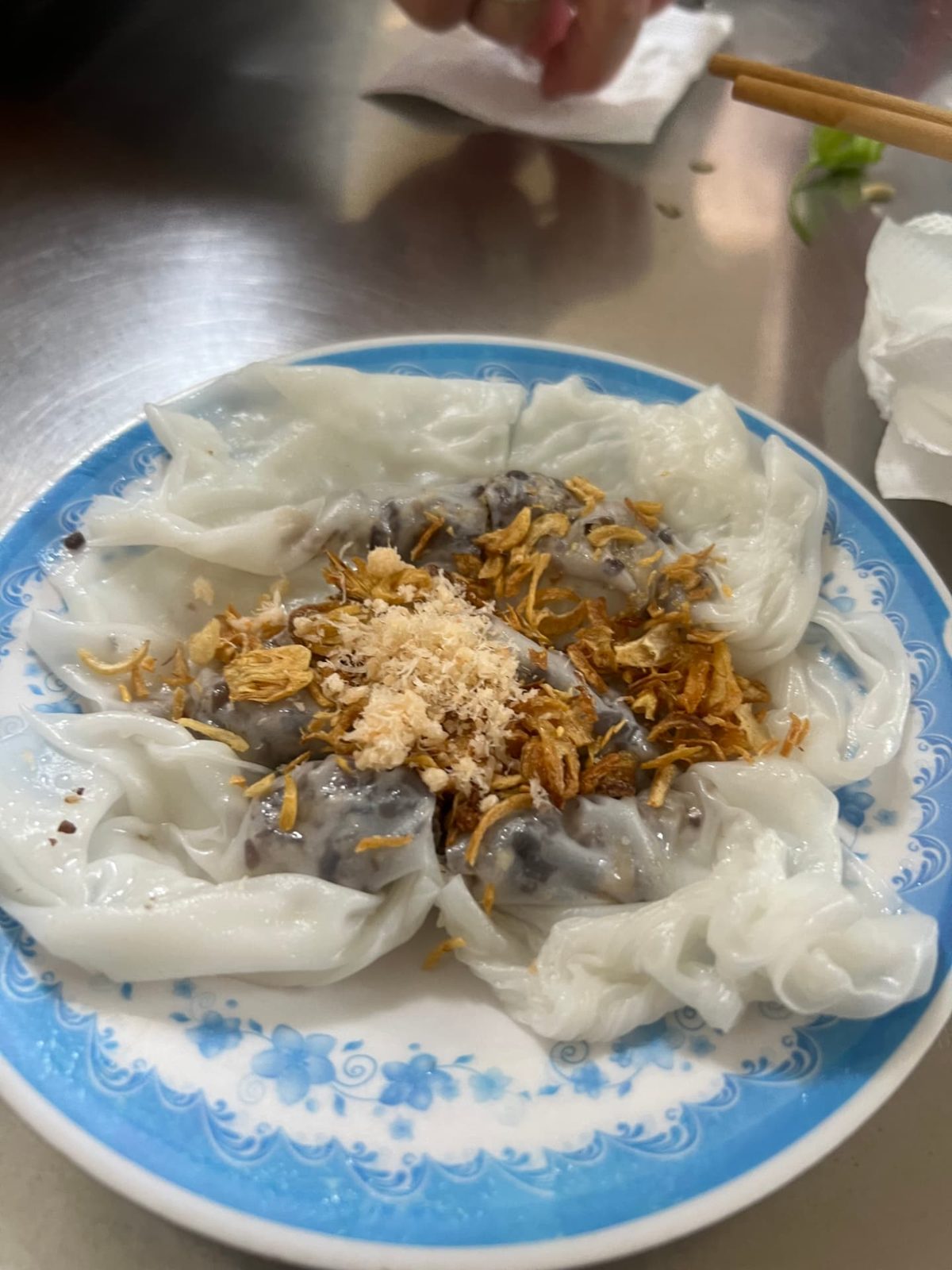 Bánh cuốn rice rolls topped with crispy fried shallots