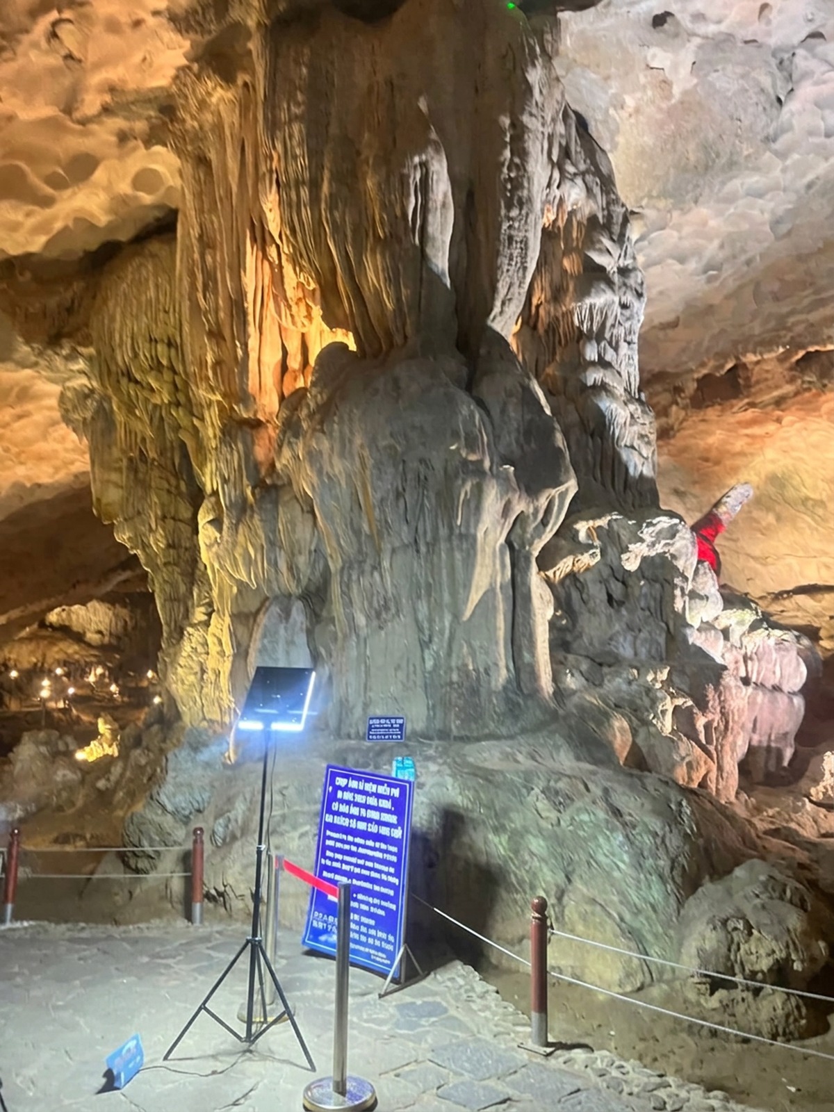 Lit stone formations inside Sung Sot Cave in Ha Long Bay, Vietnam