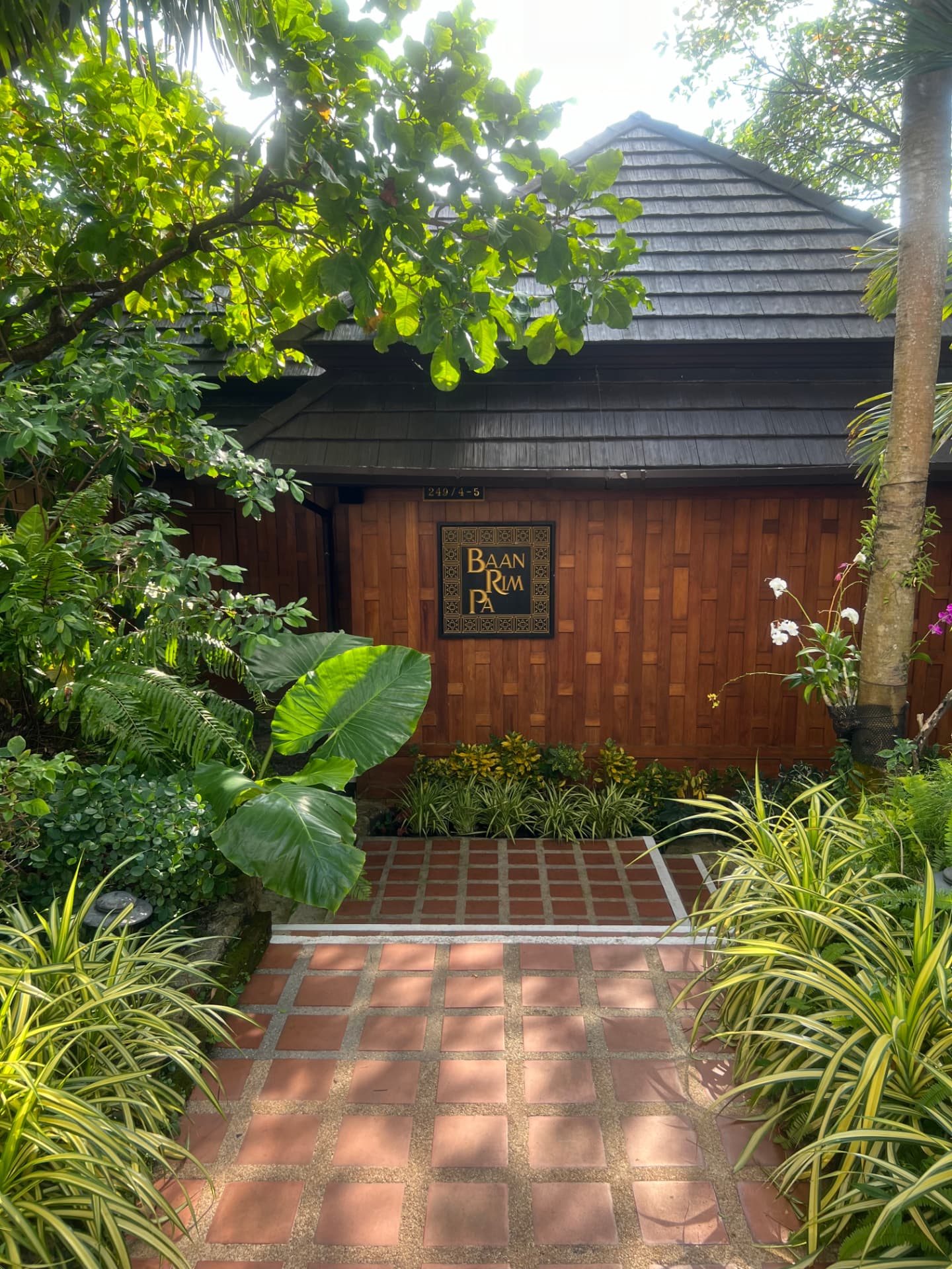 Entrance to Baan Rim Pa restaurant in Phuket, Thailand