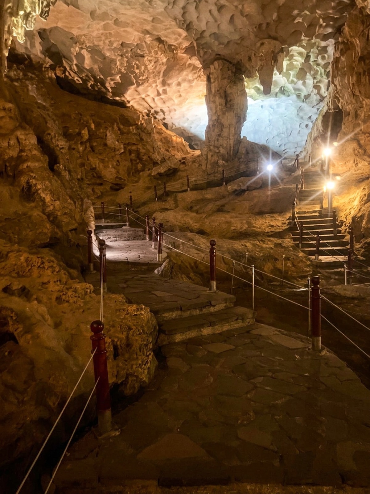 Stone steps and cave opening looking out of Sung Sot Cave