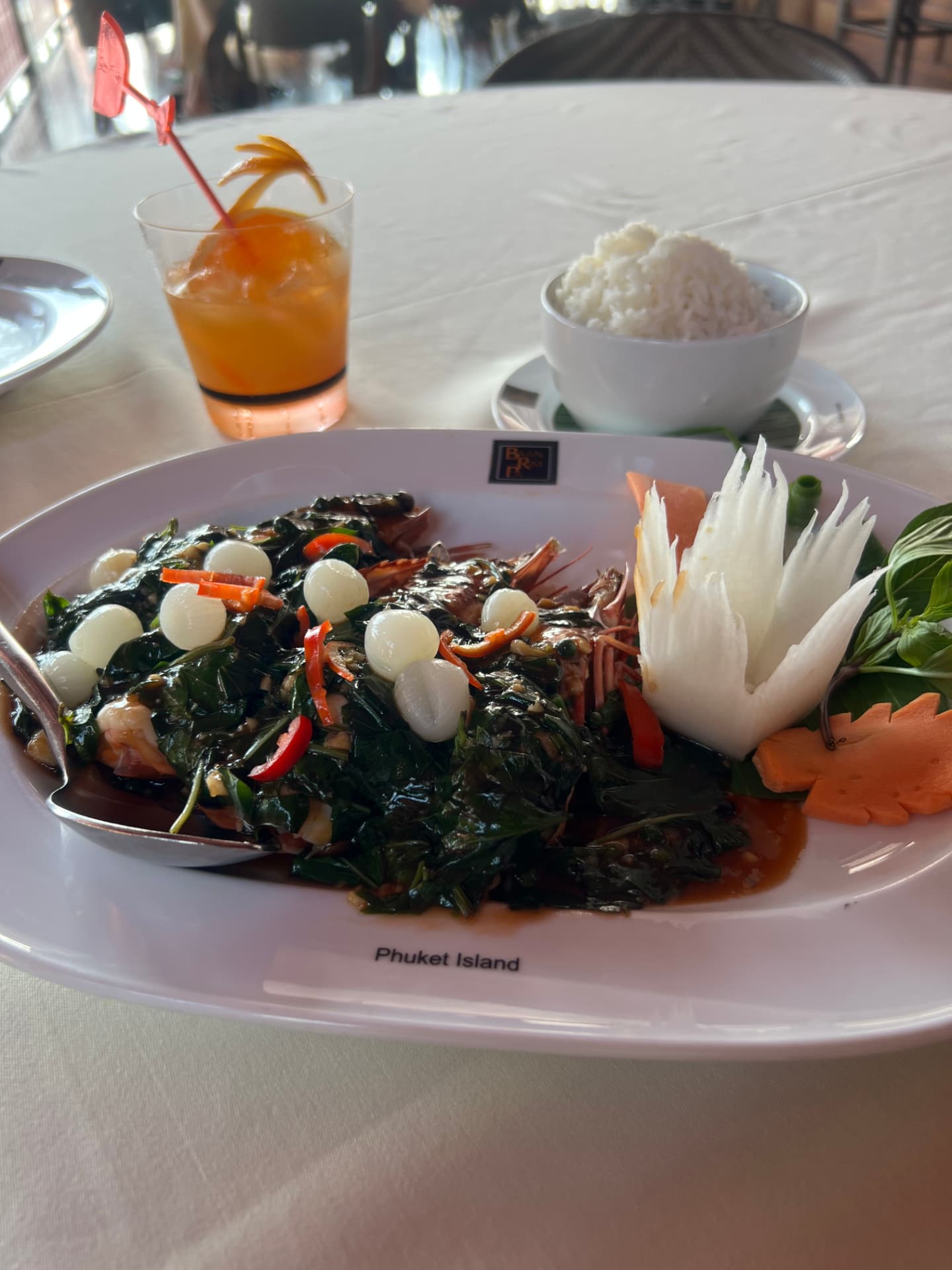 Stir-fried basil prawns with jasmine rice at Baan Rim Pa in Phuket