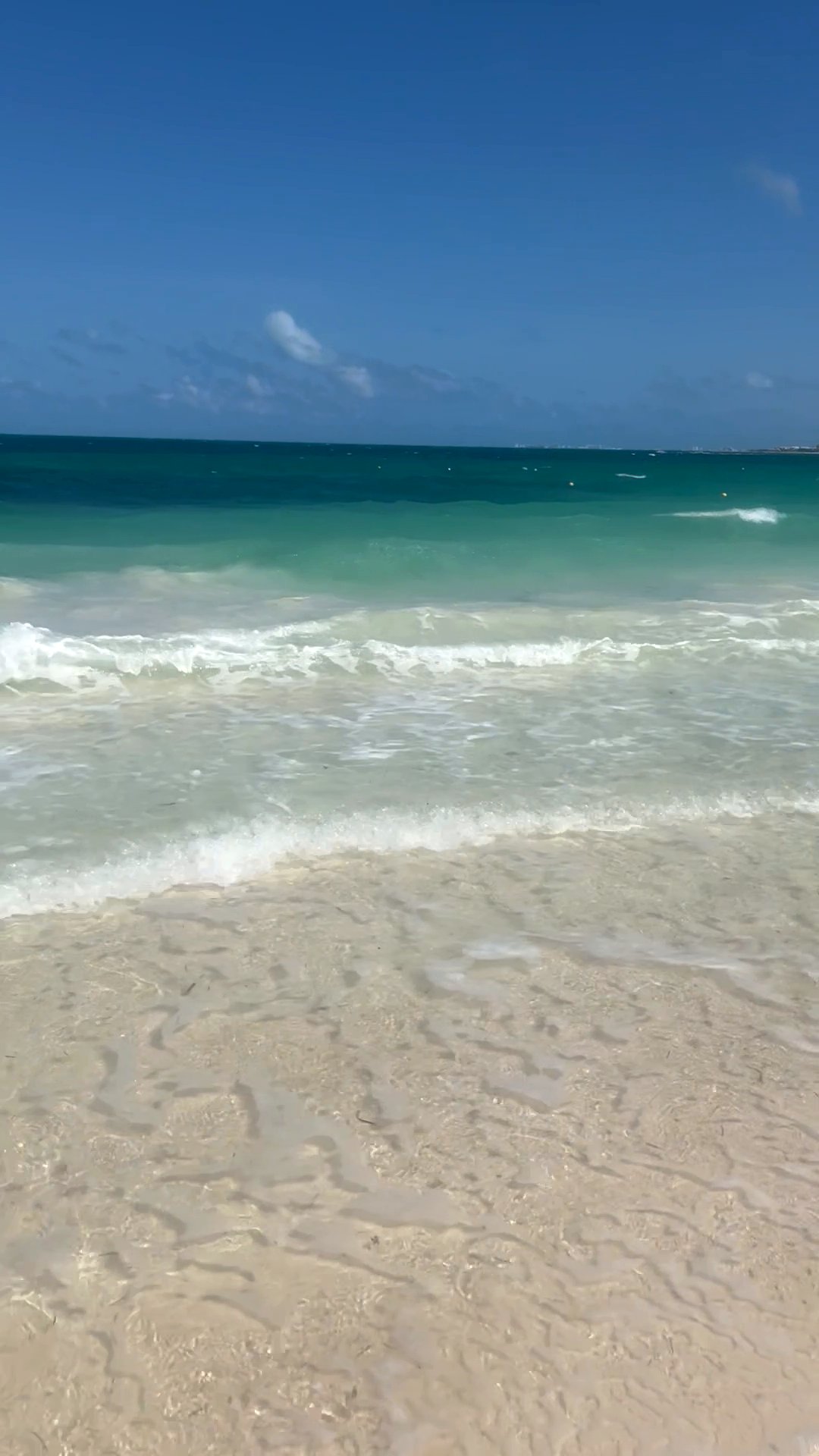 Clear turquoise water and white sand on the beach
